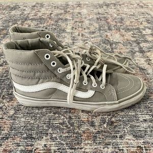 Gray Vans high top sneakers